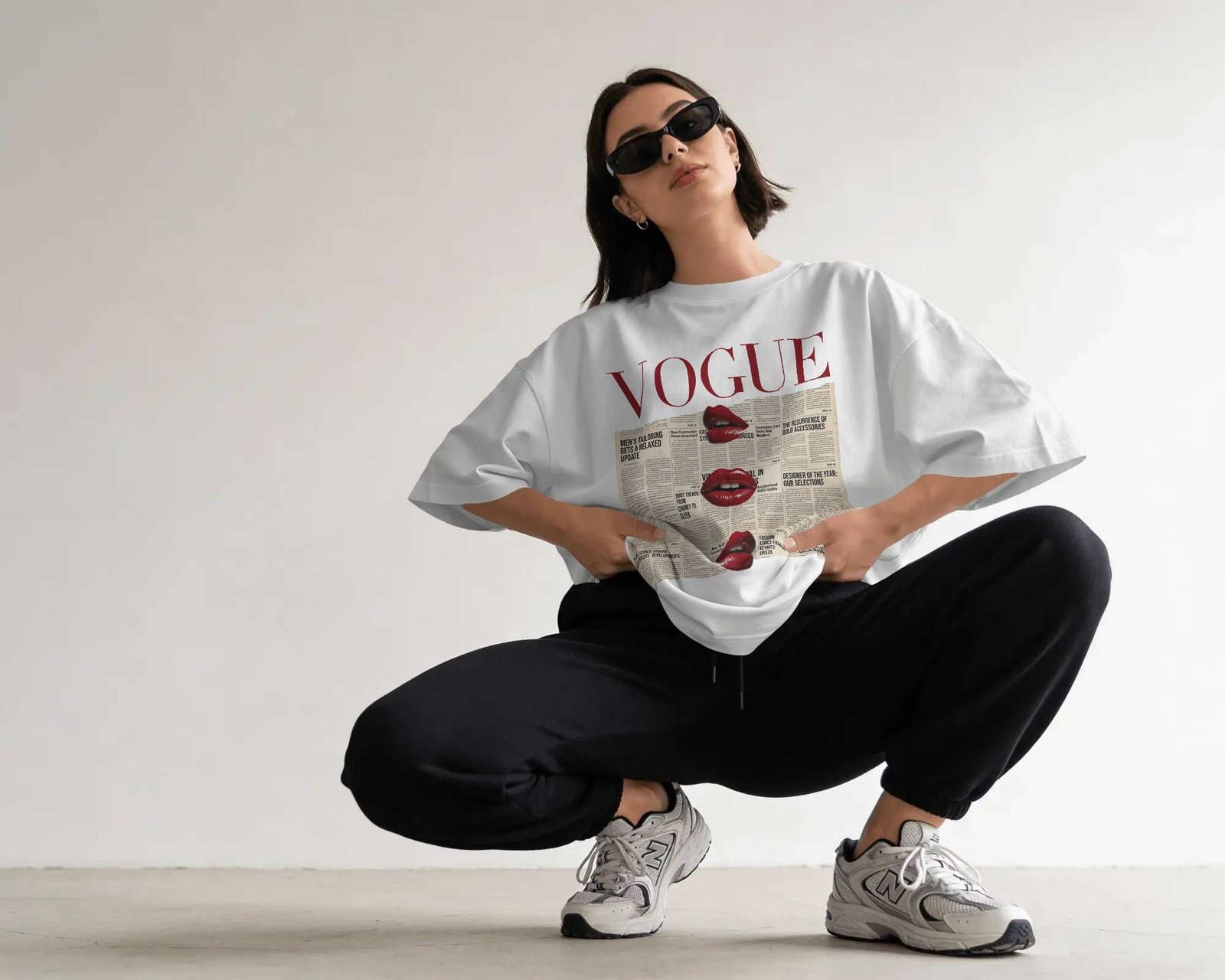 High fashion meets front-page chaos. Inspired by vintage newspaper editorials and iconic fashion covers, this piece reimagines “Vogue” through a rebellious lens, where headlines blur and attitude speaks louder than words. Wear it like breaking news. 